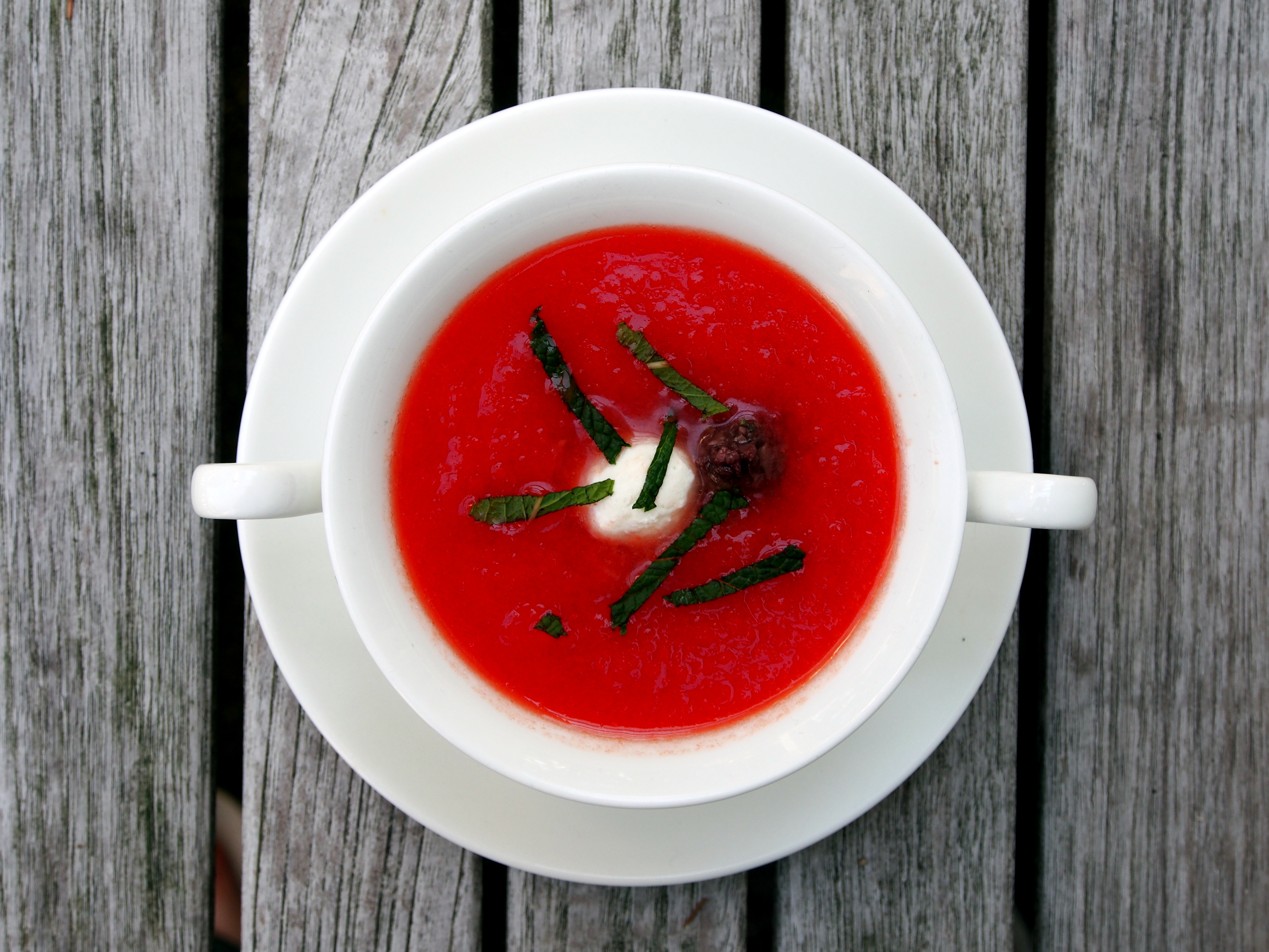 CHILLED TOMATO SOUP WITH GOAT CHEESE AND OLIVE PUREE