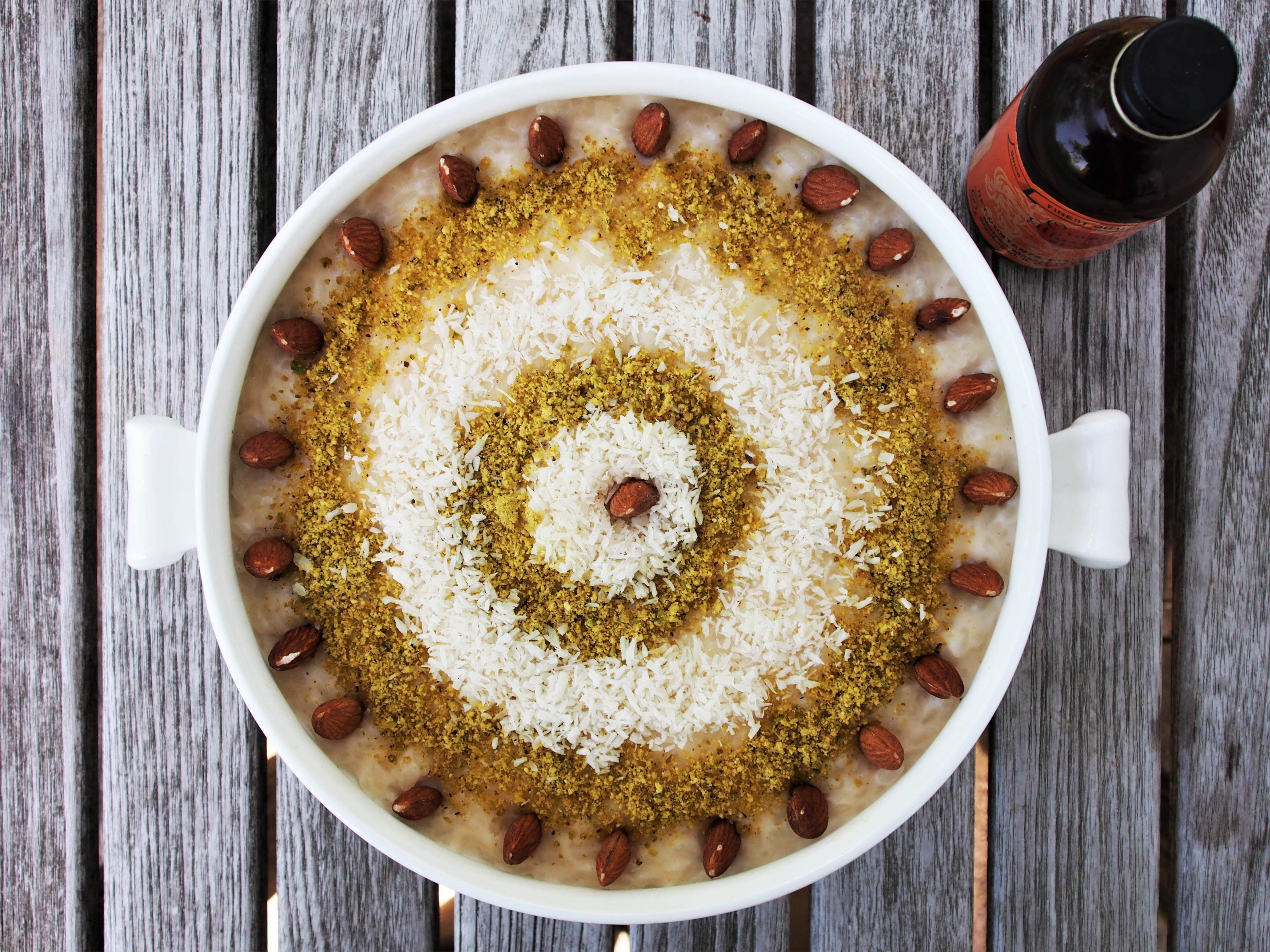 MOROCCAN ALMOND RICE PUDDING WITH COCONUT, ORANGE FLOWER-WATER AND PISTACHIOS